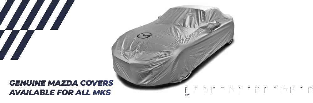 Picture of a MX5 Mk3 with a car cover